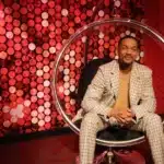 will smith wax sitting on a chair